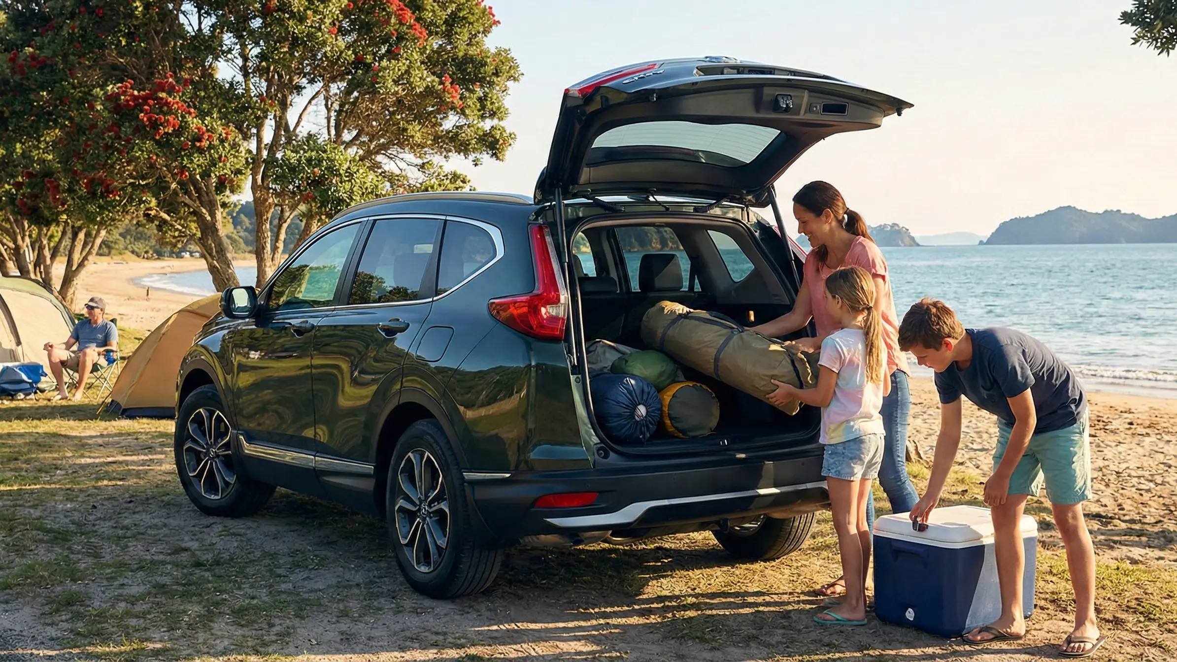 Honda CR-V SUV at campground with tent and gear showing spacious boot for family camping trips